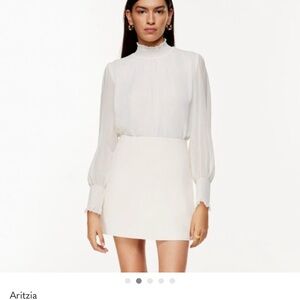 Aritzia Ivory High-Neck Smocked Cuff Blouse